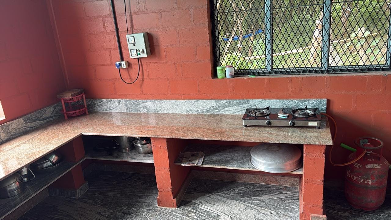 Dedicated work space with desk and lighting at Arena Gardens